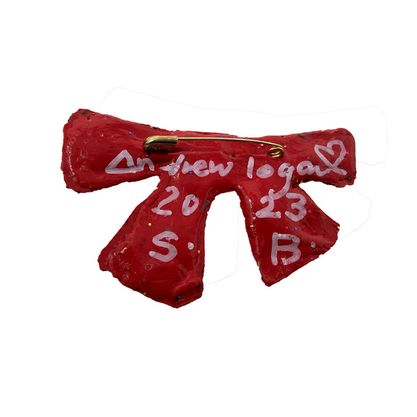 "SB" - RED BOW-TIE BROOCH, 2023